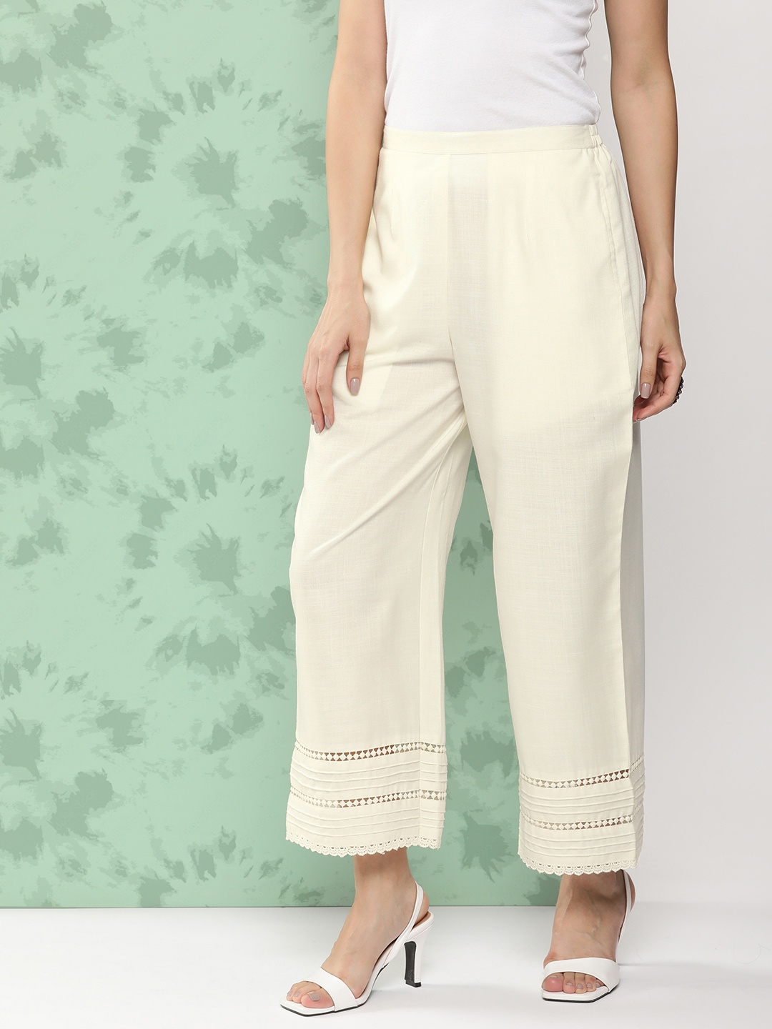 

Bhama Couture Women Self Design Loose Fit Regular Trousers, Off white