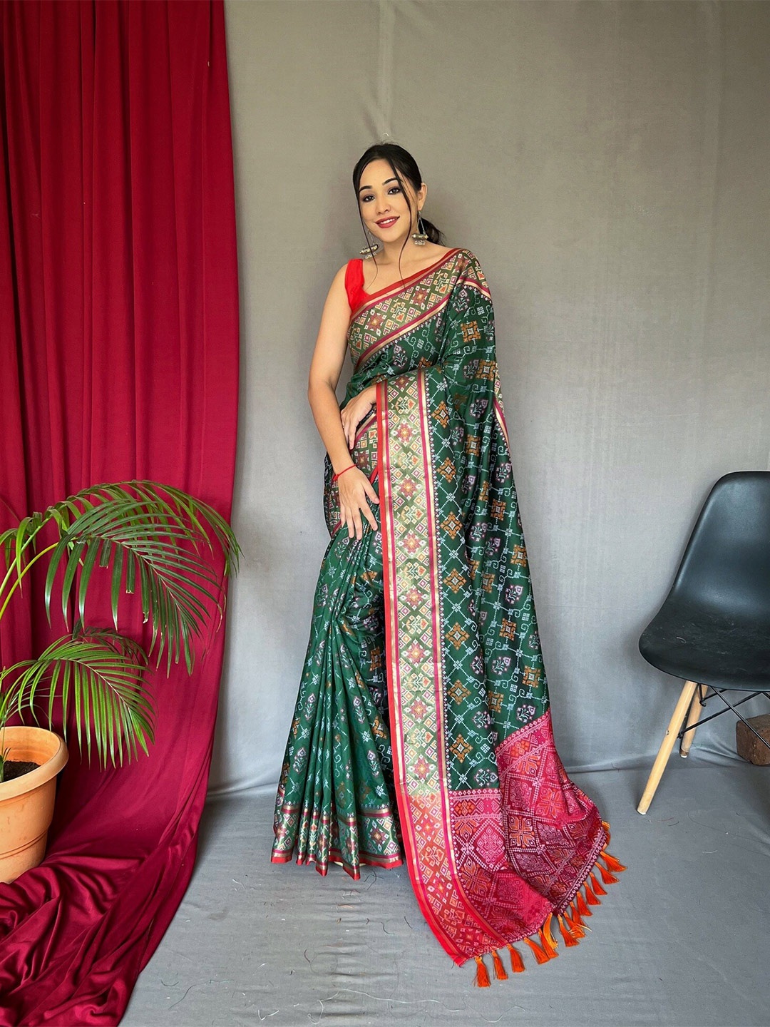 

Mitera Ethnic Motifs Woven Design Zari Silk Blend Patola Saree, Green