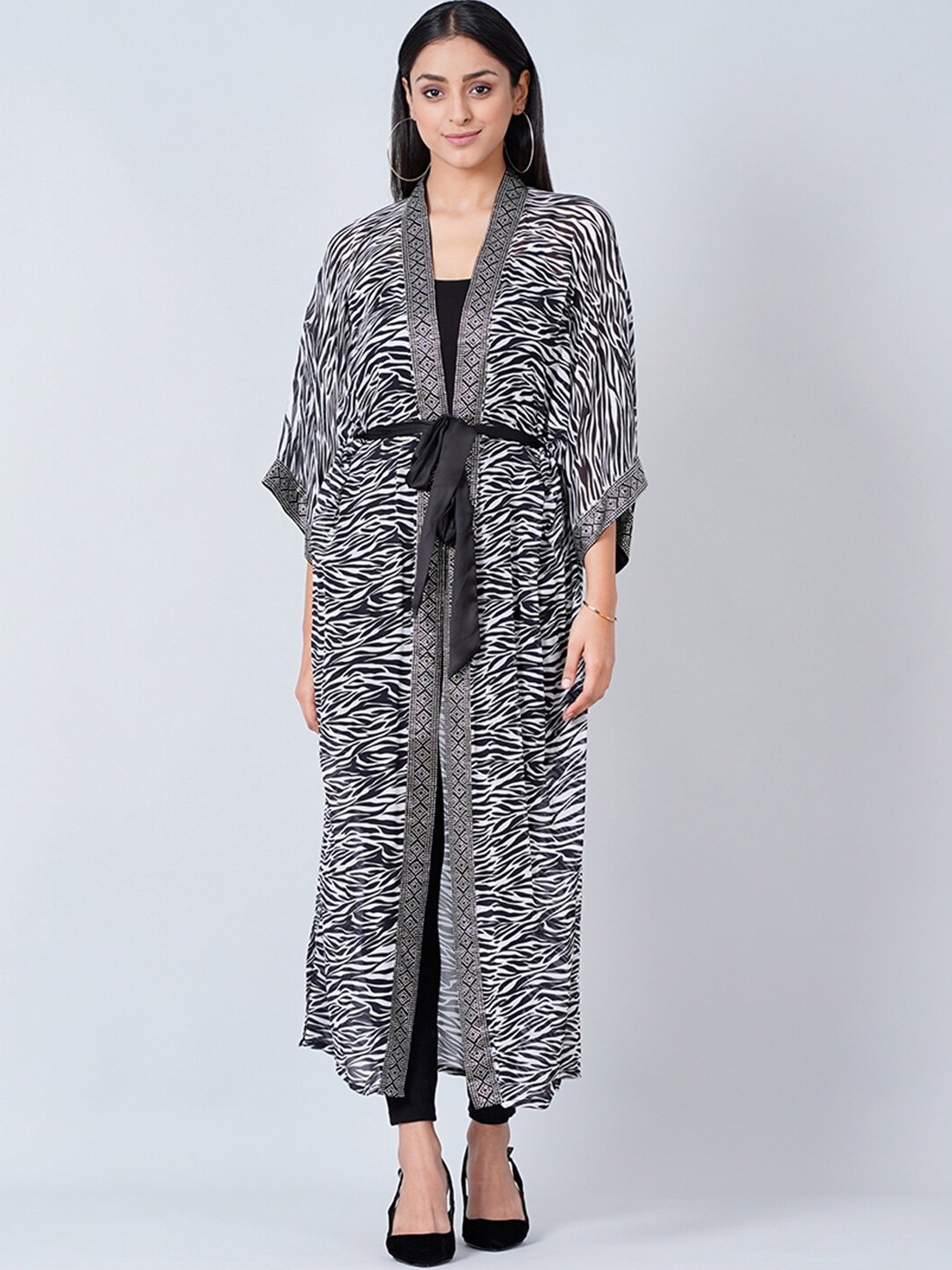

First Resort by Ramola Bachchan Women Printed Longline Tie-Up Shrug, Black