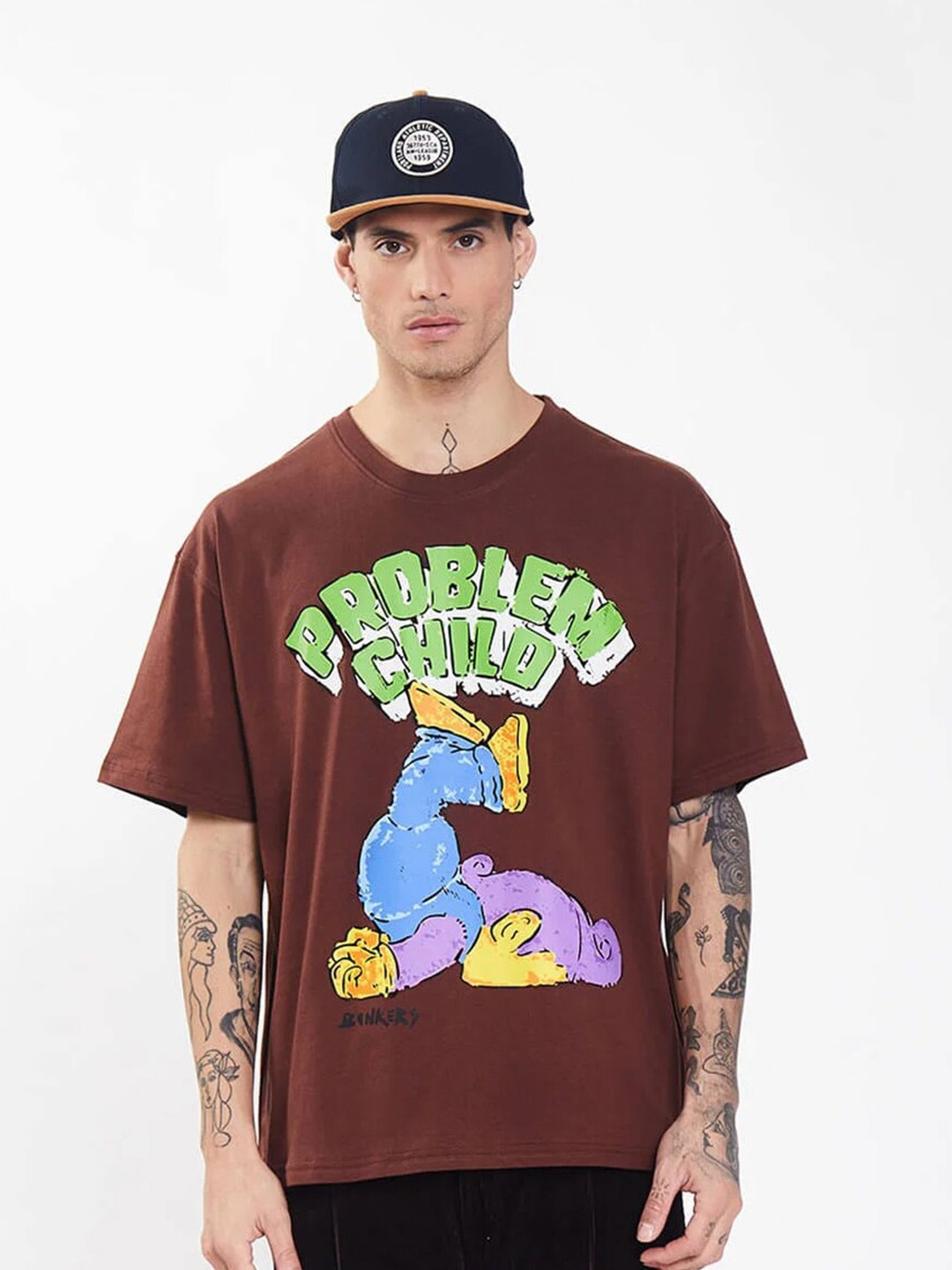 

Bonkers Corner Graphic Printed Drop Shoulder Sleeves Cotton Loose Fit T-shirt, Brown