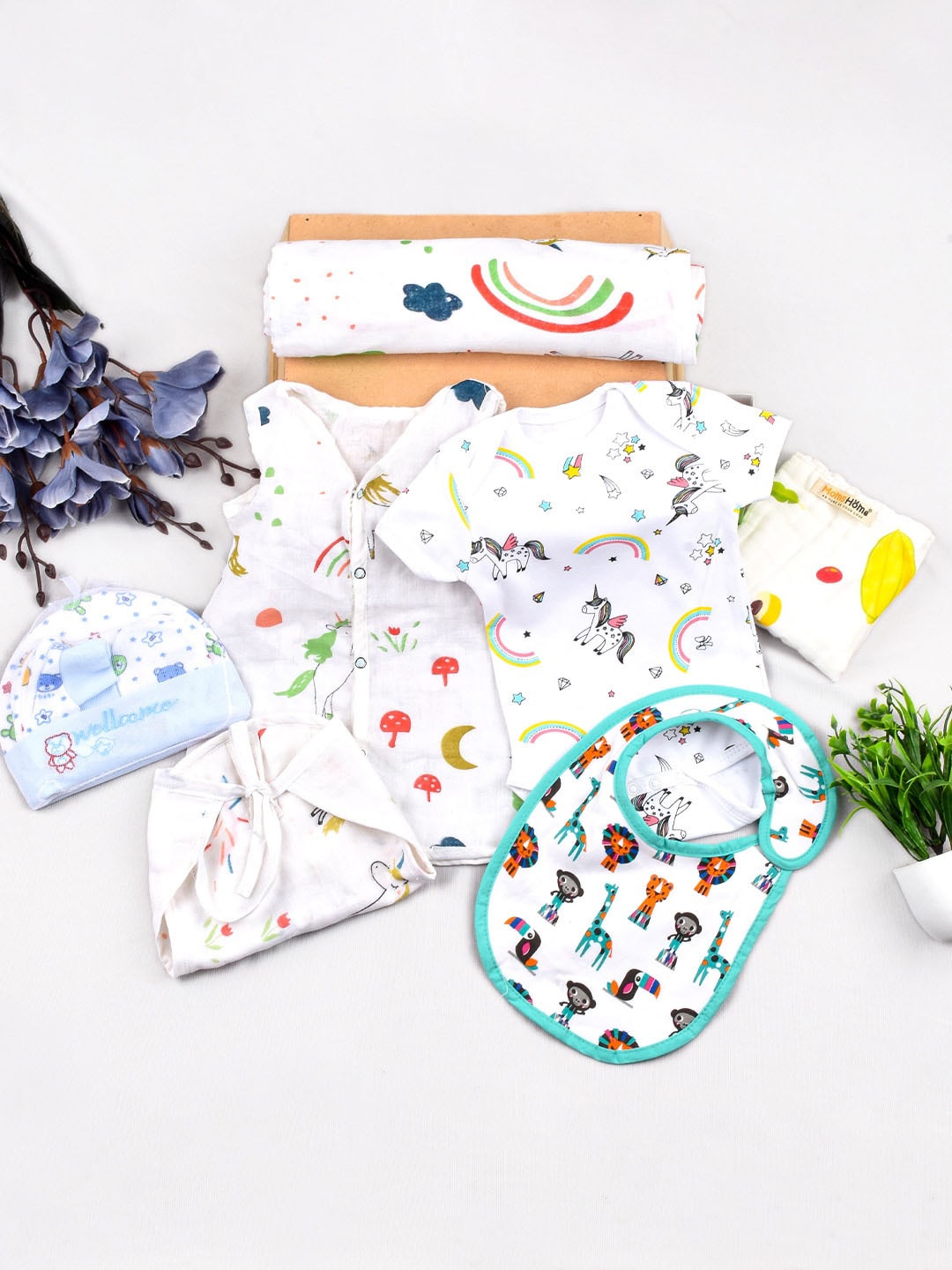 

Moms Home Infants Pack of 7 Organic Cotton Muslin Jhabla & Nappy Combo, White