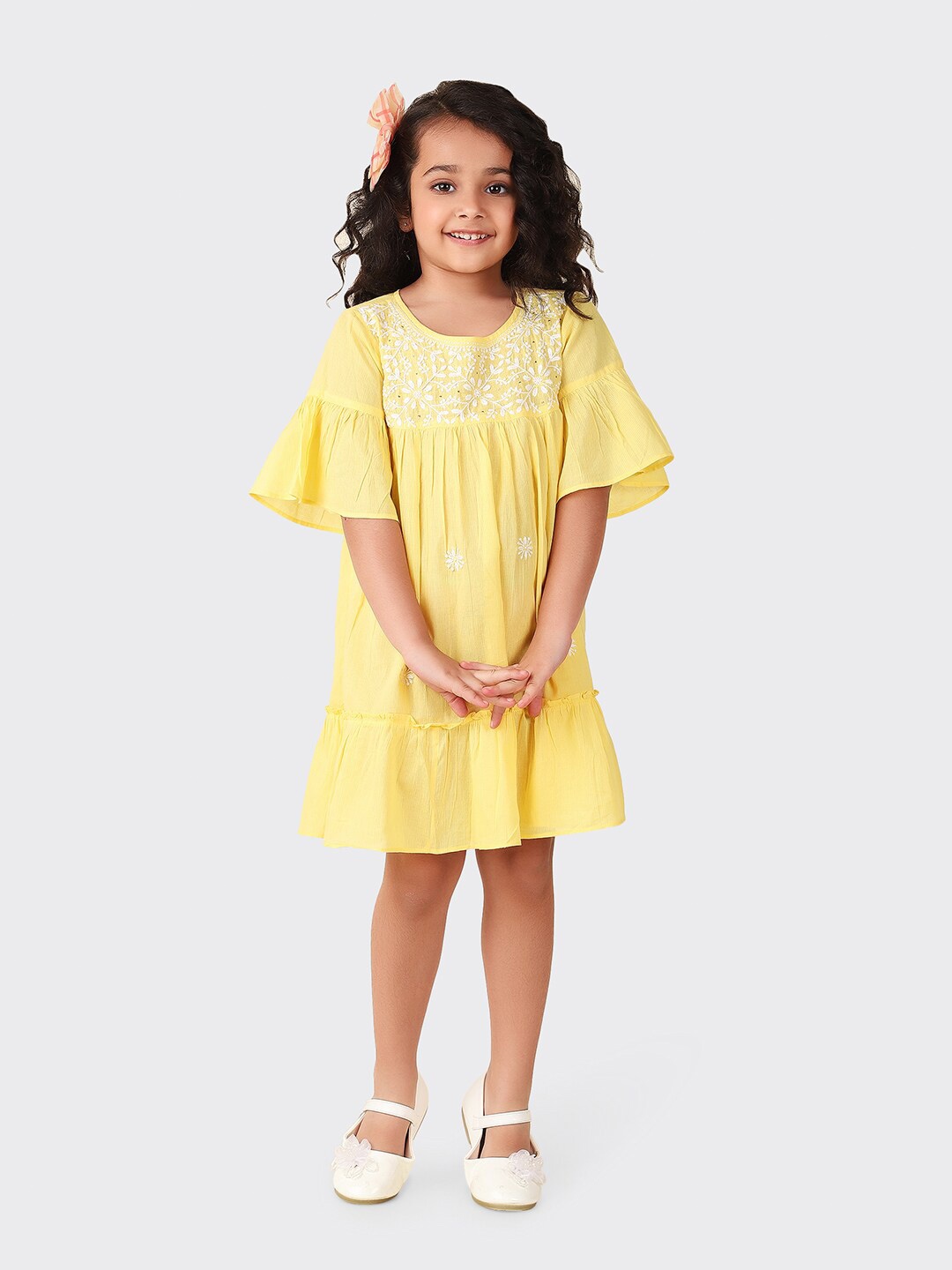 

Fabindia Girls Floral Embroidered Bell Sleeves Cotton Empire Dress, Yellow