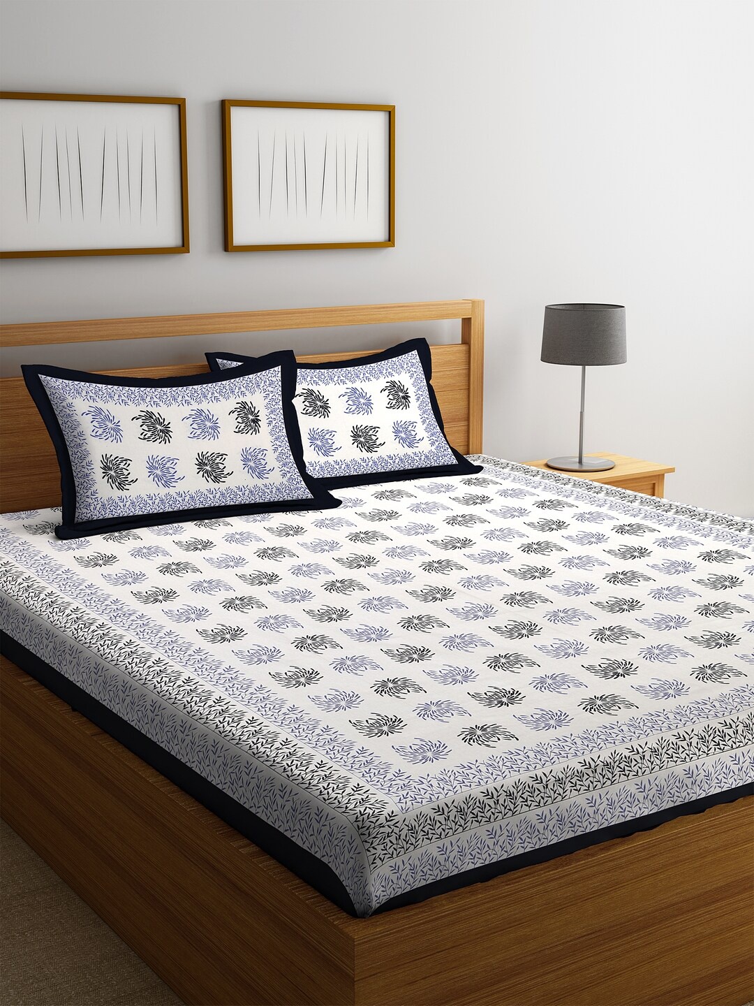 

Rajasthan Decor White & Black Floral Pure Cotton 144 TC King Bedsheet With 2 Pillow Covers