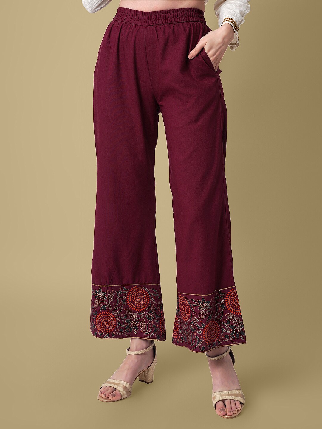 

DAEVISH Women Ethnic Motifs Printed Flared Palazzos, Burgundy