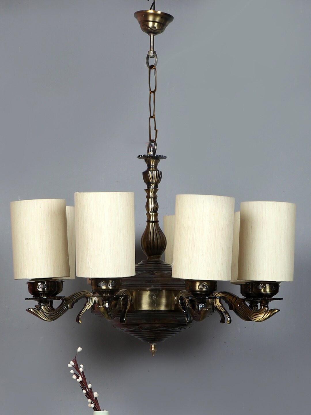 

Devansh Off-White & Gold-Toned Cotton 8 Lamp Shades Chandelier