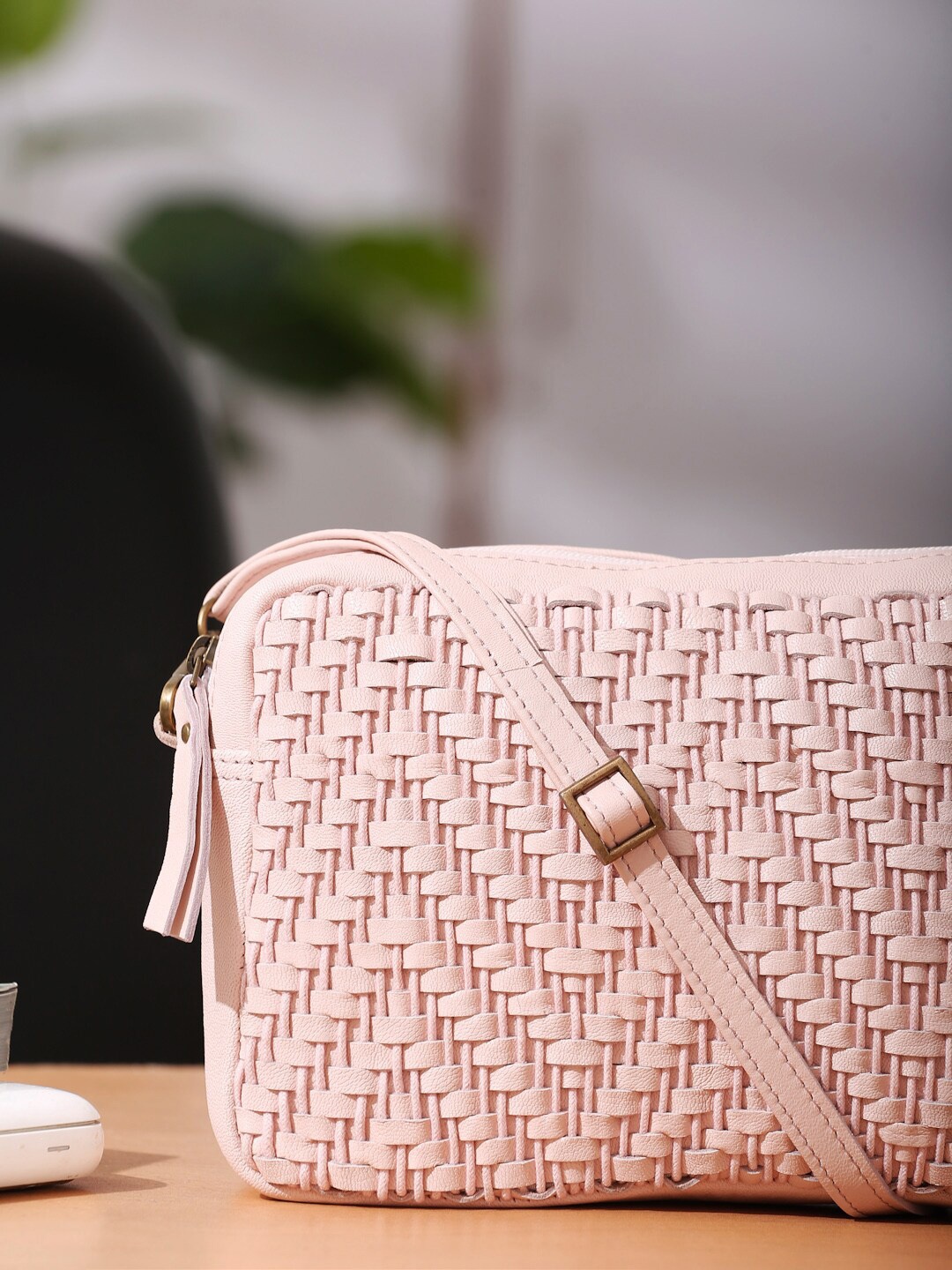 

Suvaska Textured Leather Structured Sling Bag, Pink