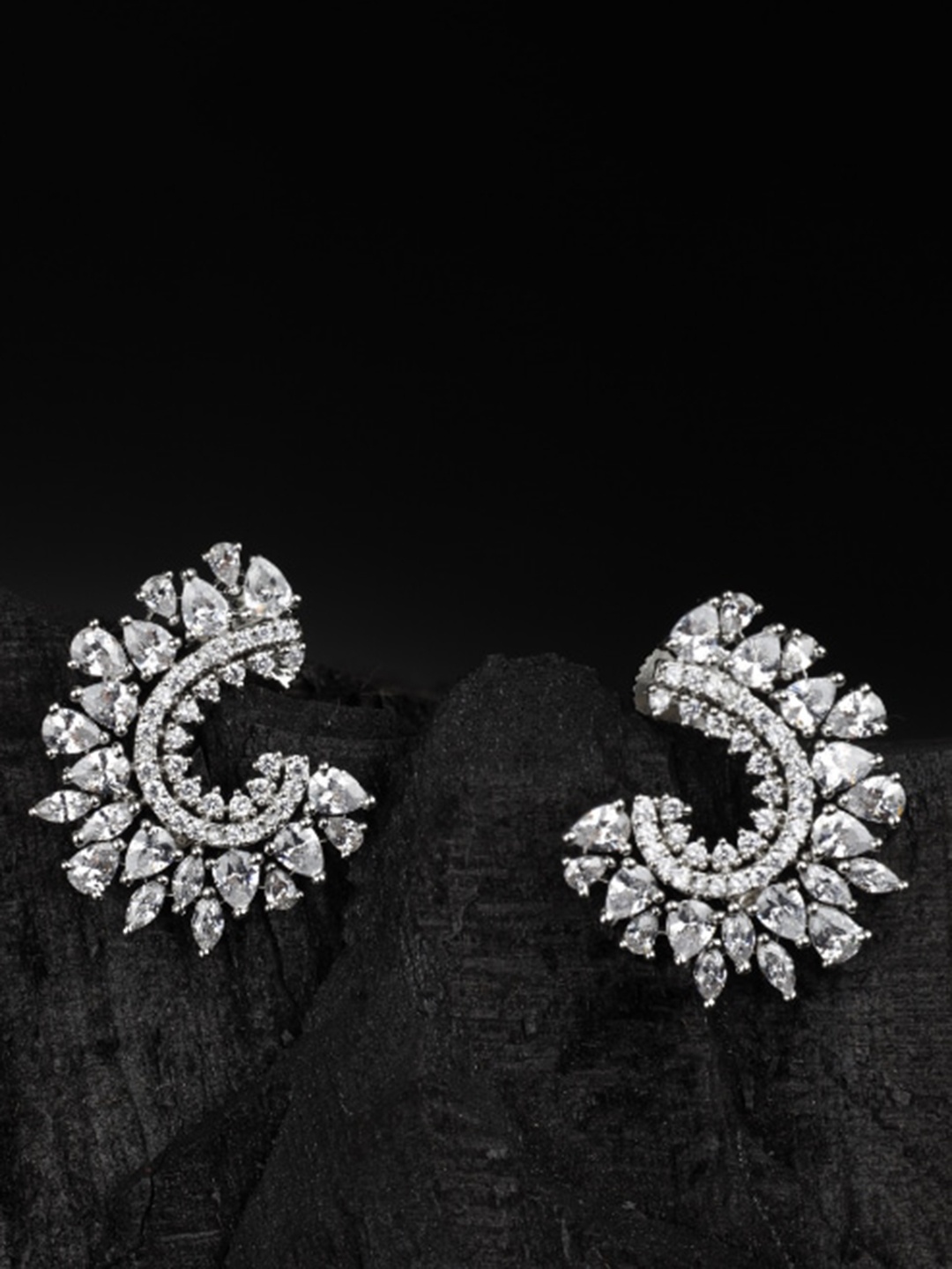 

Kord Store Rhodium Plated Crescent Shaped Studs Earrings, Silver