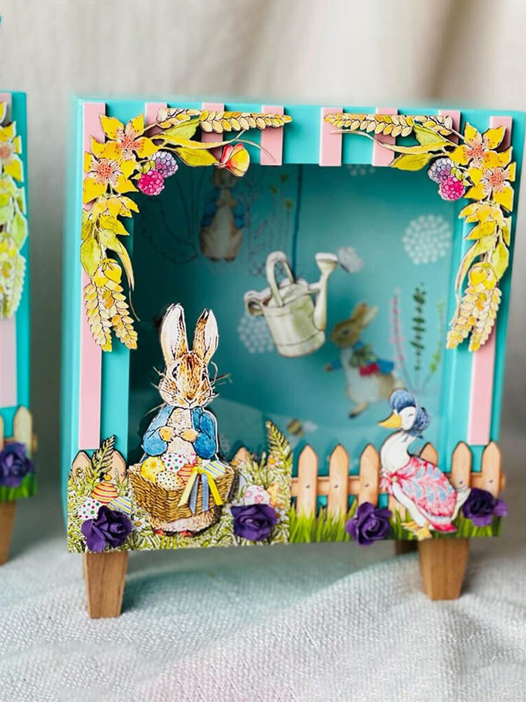 

Little Surprise Box LLP Sea Green & Yellow The Peter Rabbit Piggy Showpieces