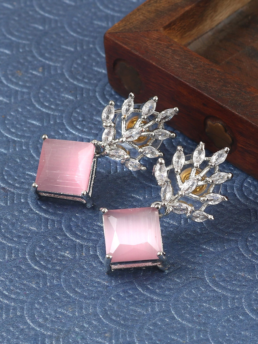 

Jewar Mandi Silver Plated Leaf Shaped Cubic Zirconia Drop Earrings