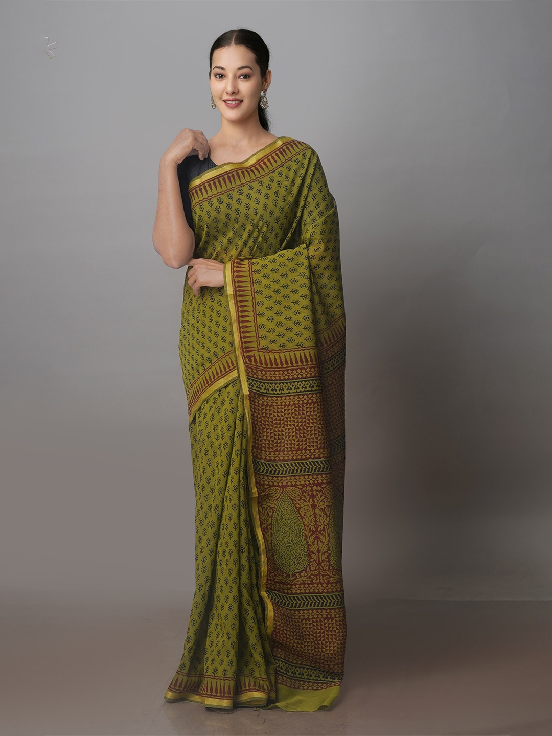 

Unnati Silks Green & Black Ethnic Motifs Zari Chanderi Saree