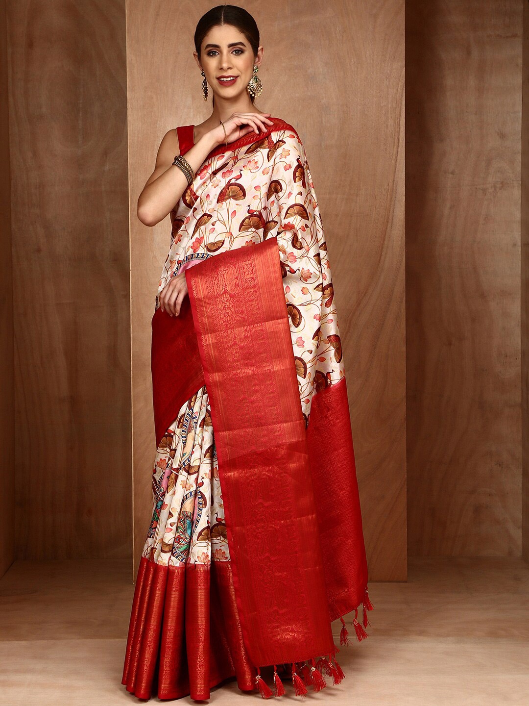 

Anouk Ethnic Motifs Printed Zari Patola Saree, Beige