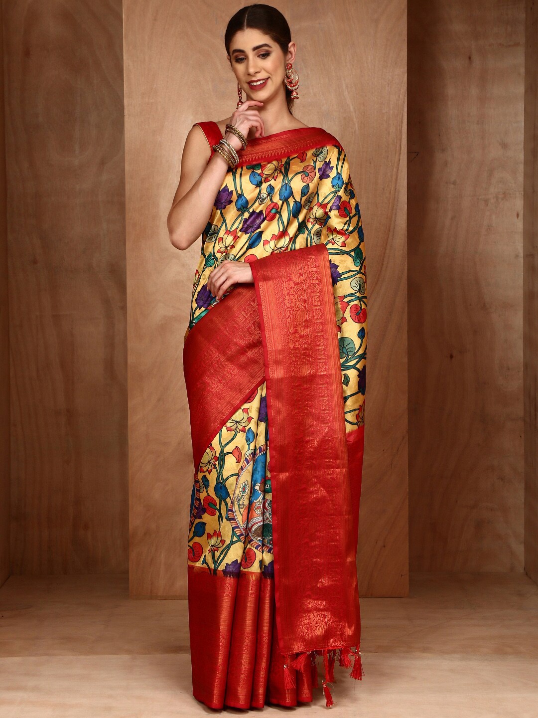 

Anouk Floral Printed Zari Patola Saree, Yellow