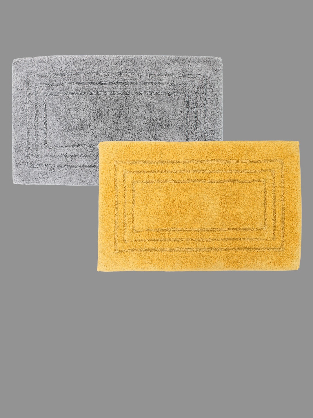 

AVI Living Grey & Mustard-Yellow 2-Pieces Self Design 1500 GSM Pure Cotton Bath Rugs