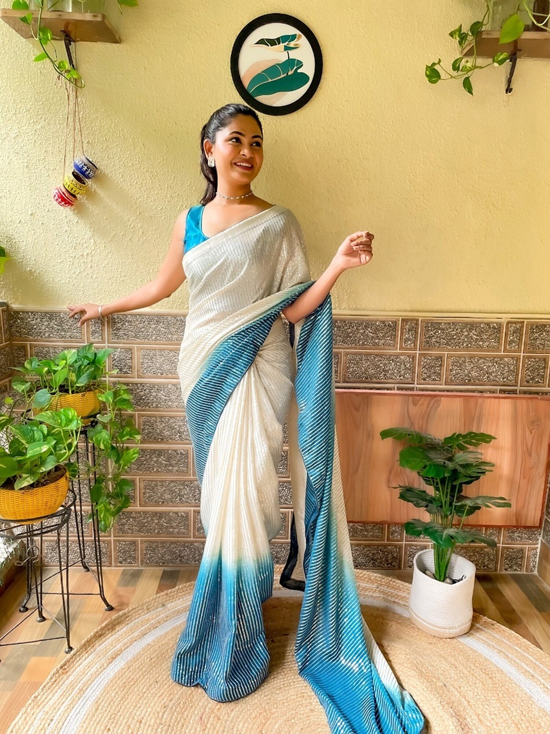 

Mitera Sequinned Embellished Saree With Contrast Border, Teal