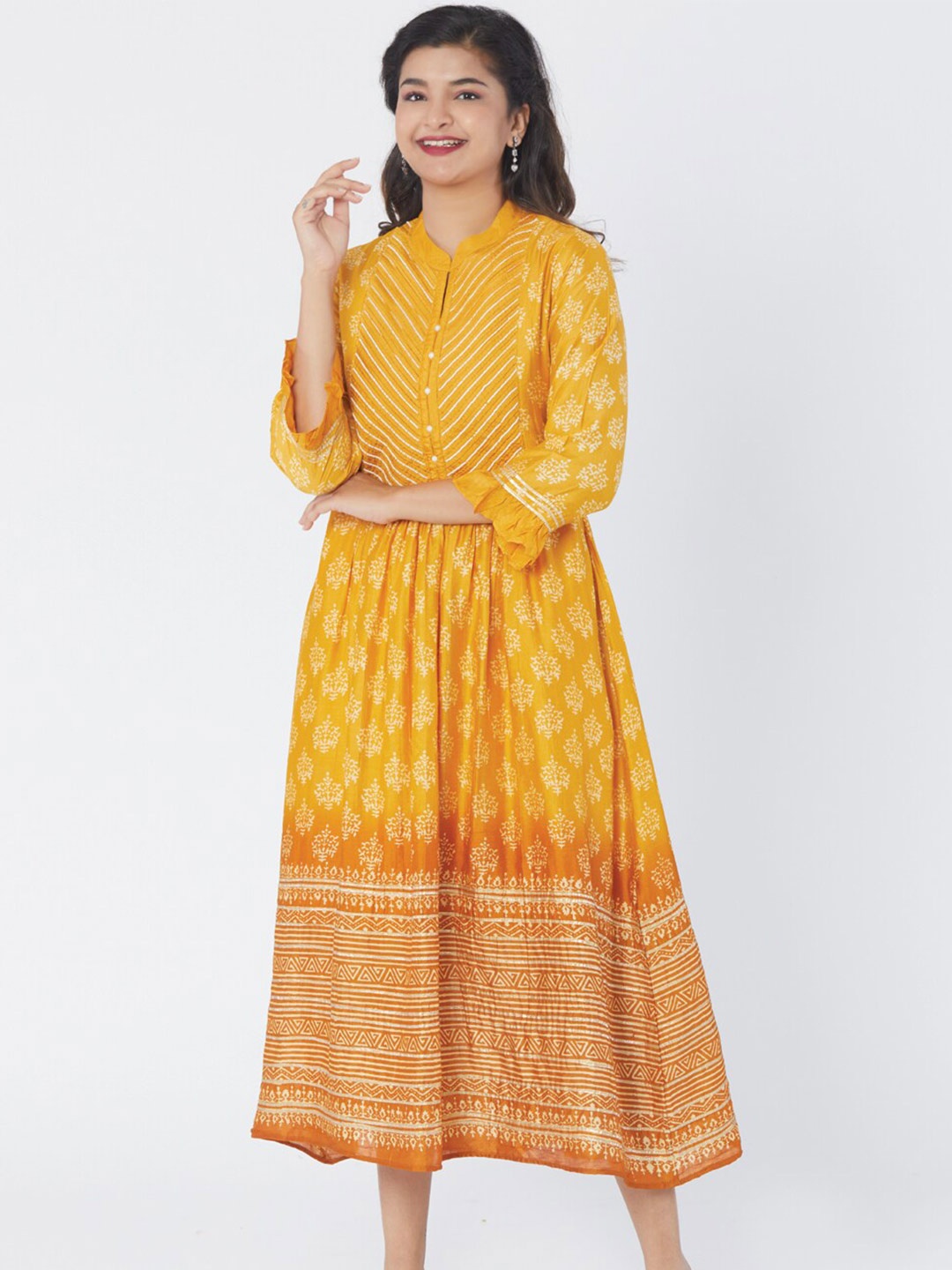 

taruni Printed Ethnic Fit & Flare Dresses, Mustard