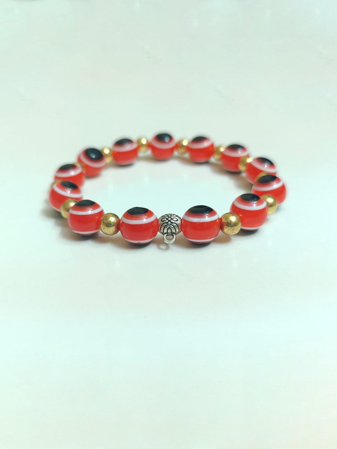 

Pinapes Charm Eye Elasticated Slip-On Bracelet, Red