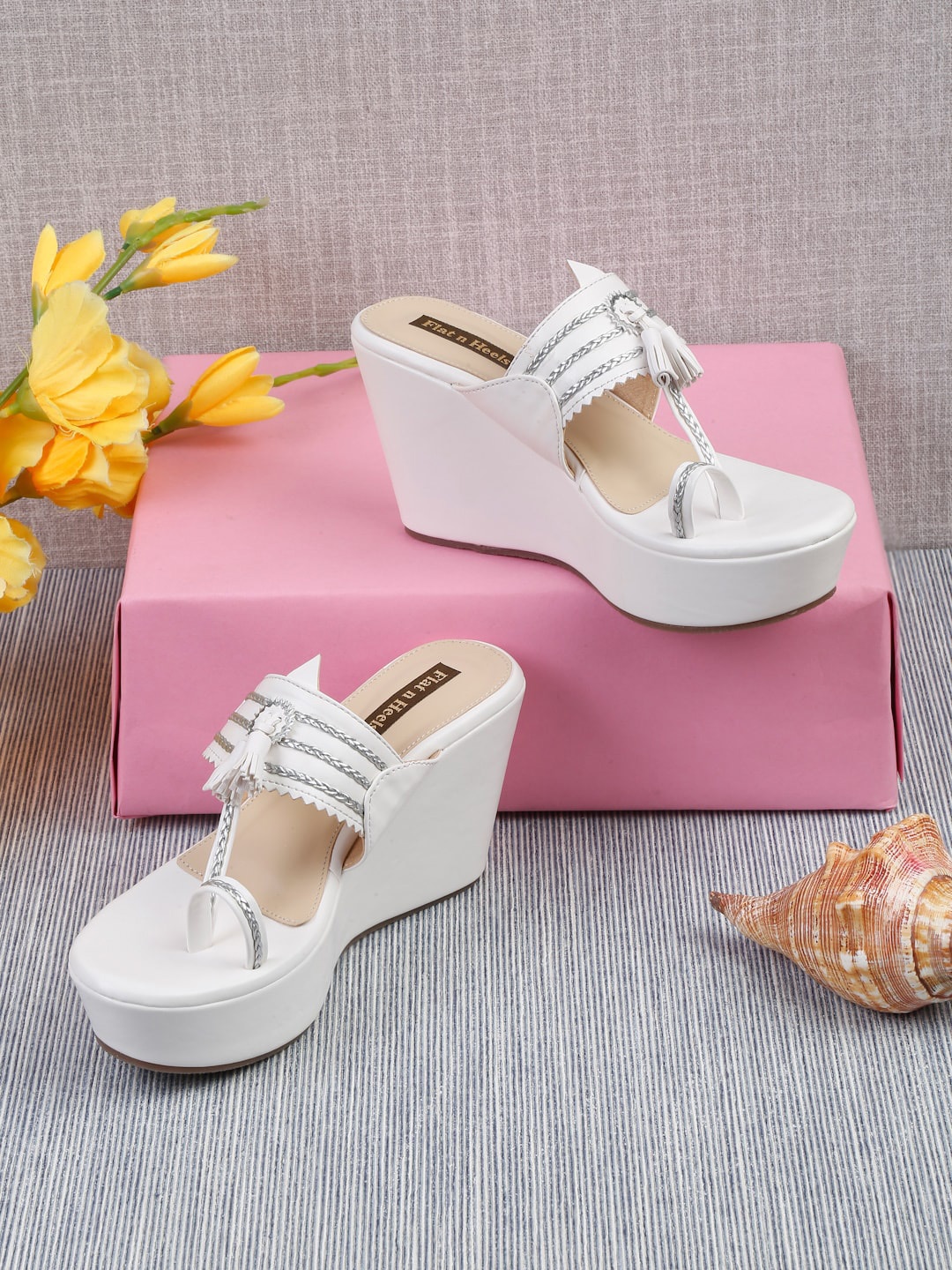 

Flat n Heels Tasseled One Toe Wedge Heels, White