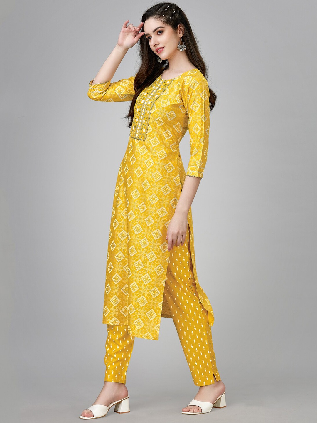 

WEAVETECH IMPEX Ethnic Motifs Printed Thread Work Sequinned Liva Kurta with Trousers, Mustard