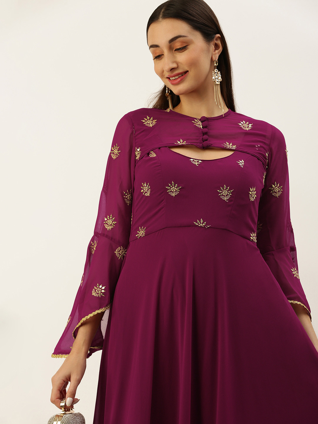 

Ethnovog Magenta Ethnic Motifs Embroidered Georgette Maxi Ethnic Dress With Shrug