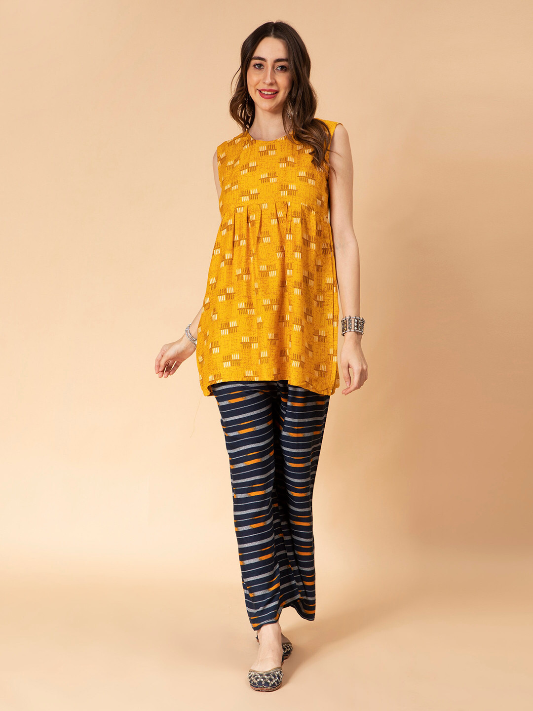 

Fabclub Geometric Printed Sleeveless A-Line Kurti, Mustard