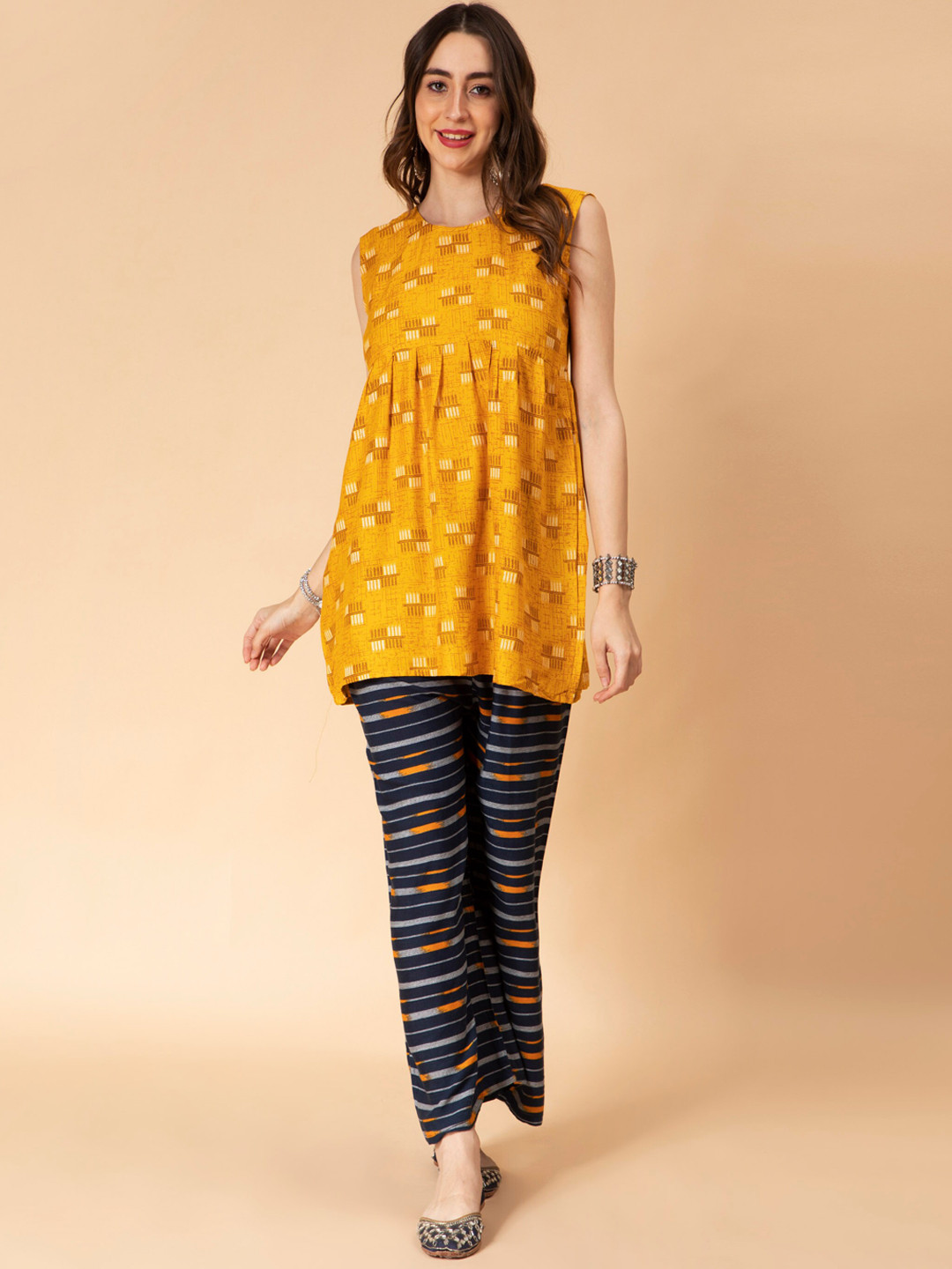 

Fabclub Abstract Printed A-Line Kurti with Palazzos, Mustard