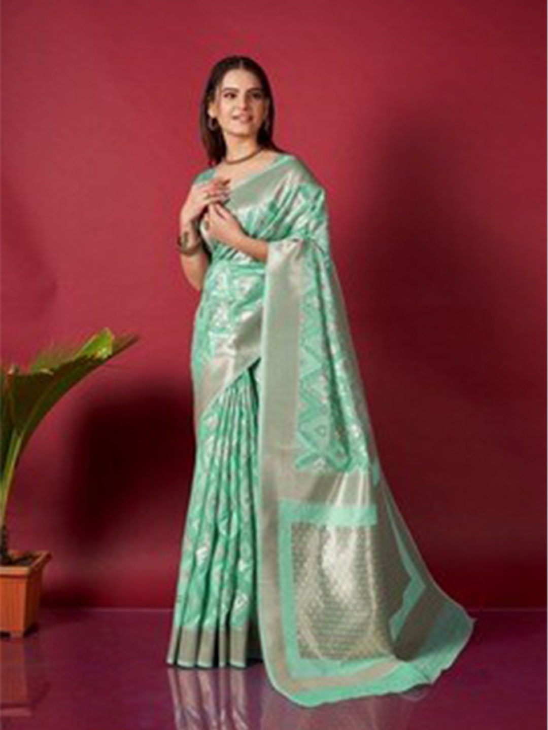 

Exclusiva Sea Green & Gold-Toned Woven Design Zari Pure Linen Ikat Saree