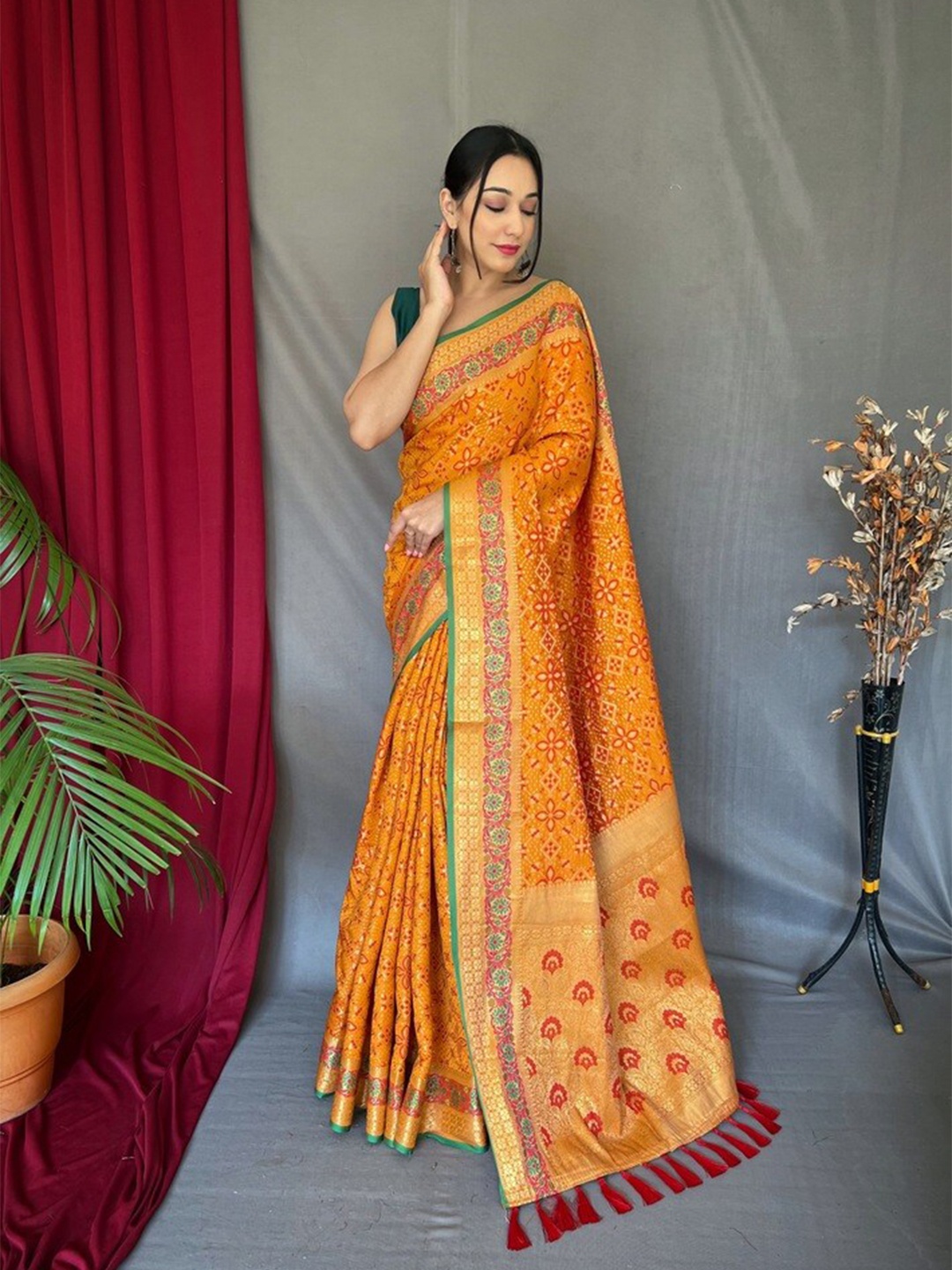 

Exclusiva Woven Design Zari Patola Saree, Mustard