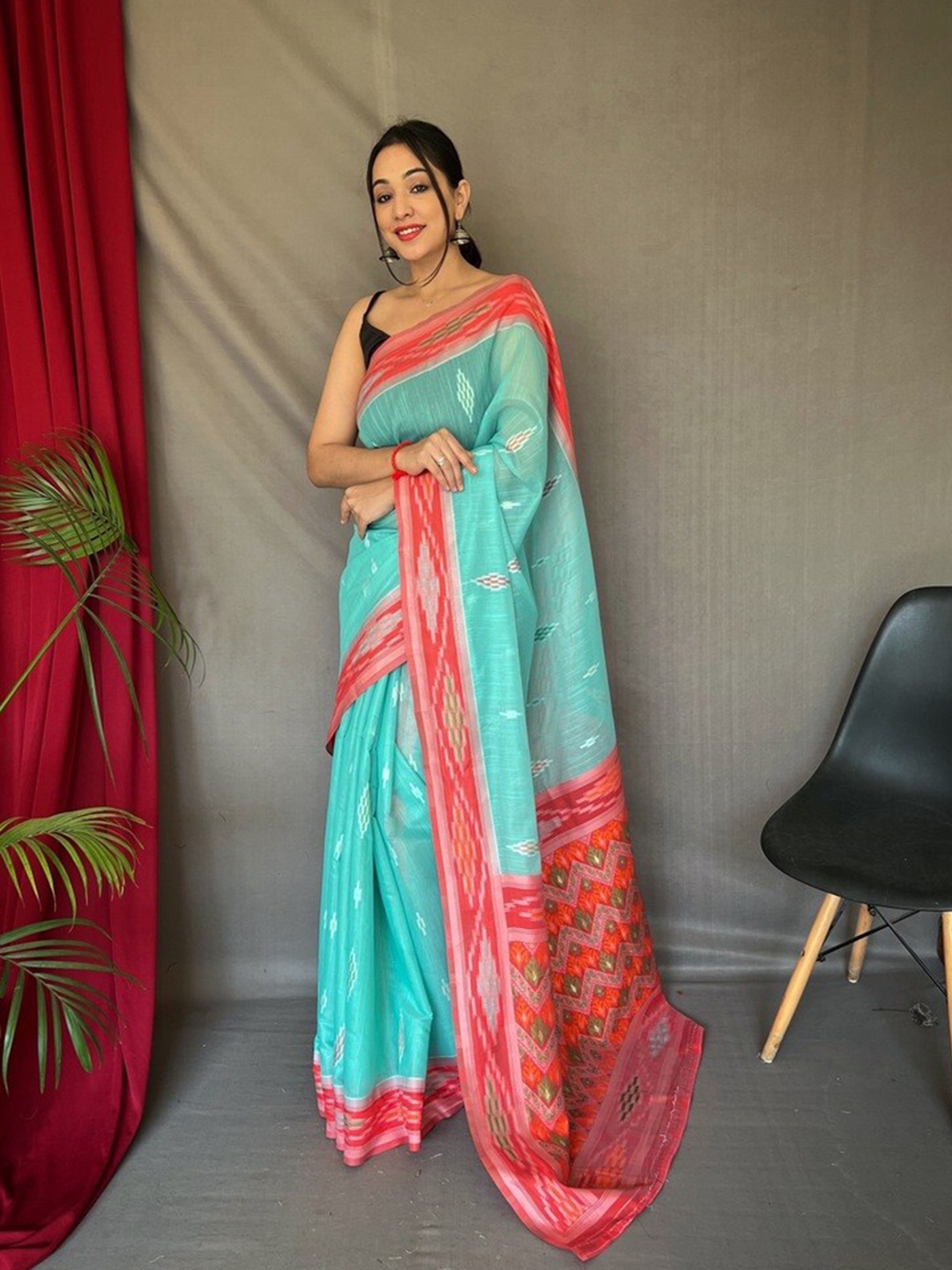 

Exclusiva Woven Design Pure Linen Ikat Saree, Turquoise blue