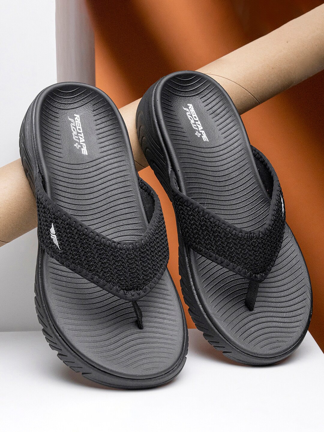

Red Tape Men Self Design Rubber Thong Flip-Flops, Black