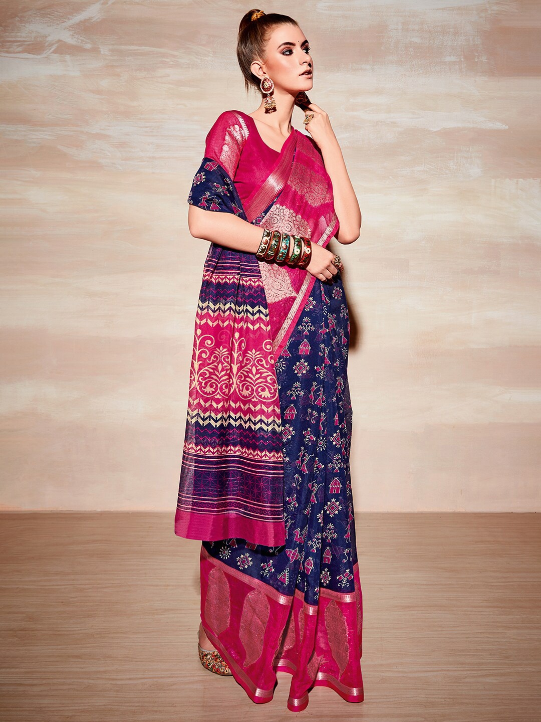 

Saree mall Navy Blue & Purple Ethnic Motifs Printed Zari Sarees