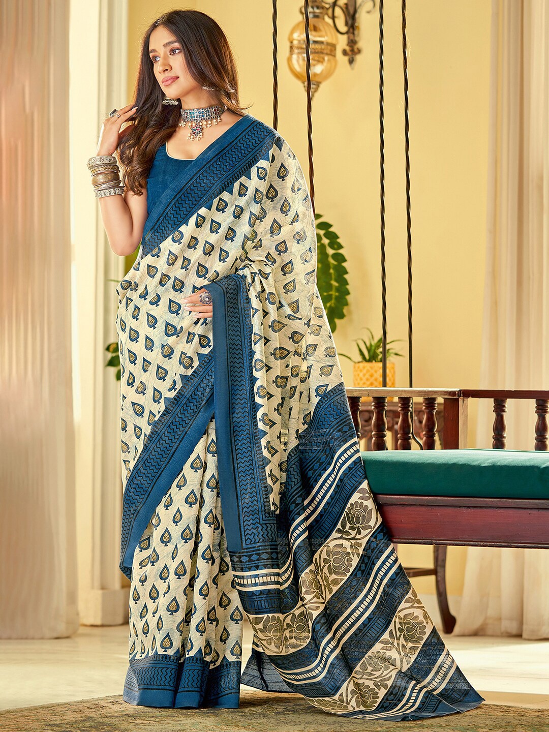 

Saree mall Off White & Blue Ethnic Printed Silk Bhagalpuri Sarees