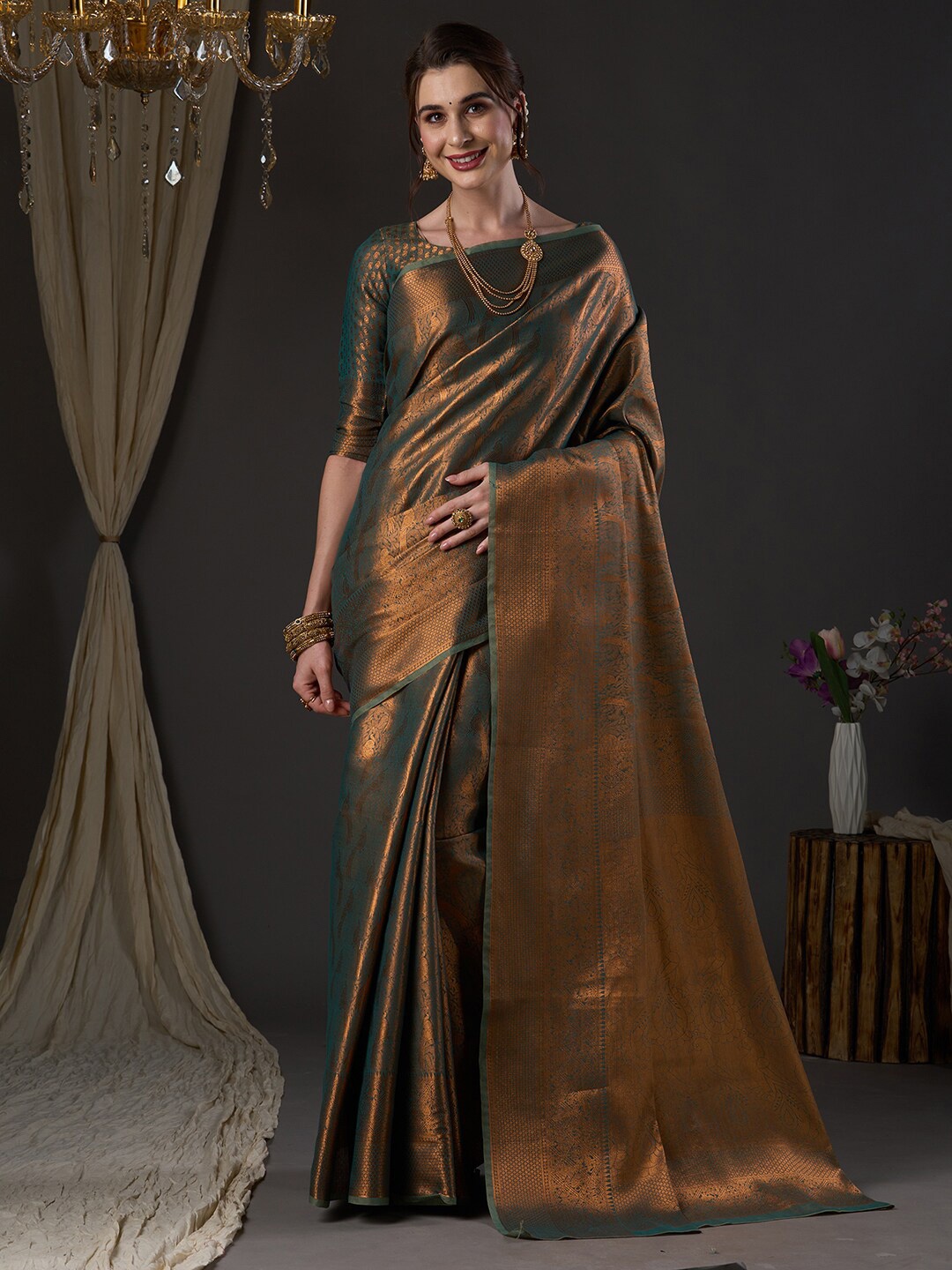 

Saree mall Green & Gold-Toned Ethnic Motif Woven Design Zari Kanjeevaram Sarees