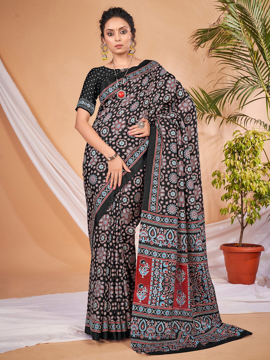 

Saree mall Black & Red Ethnic Motifs Printed Sarees