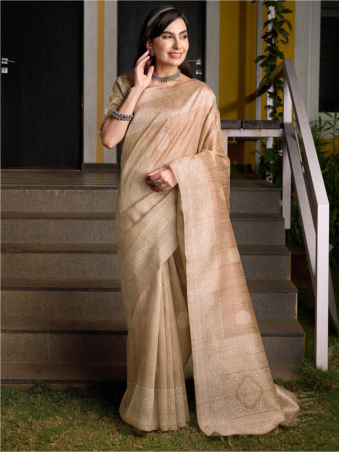 

Saree mall Beige And Gold-Toned Ethnic Motifs Printed Sarees