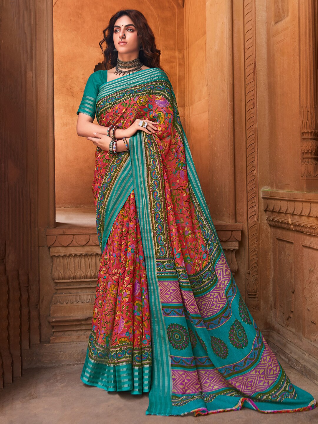 

Saree mall Pink & Green Ethnic Motifs Printed Zari Linen Sarees