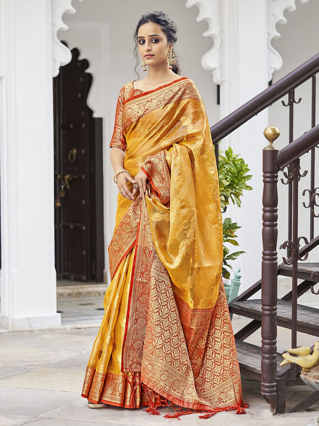 

Satrani Ethnic Motifs Woven Design Zari Tissue Saree, Yellow