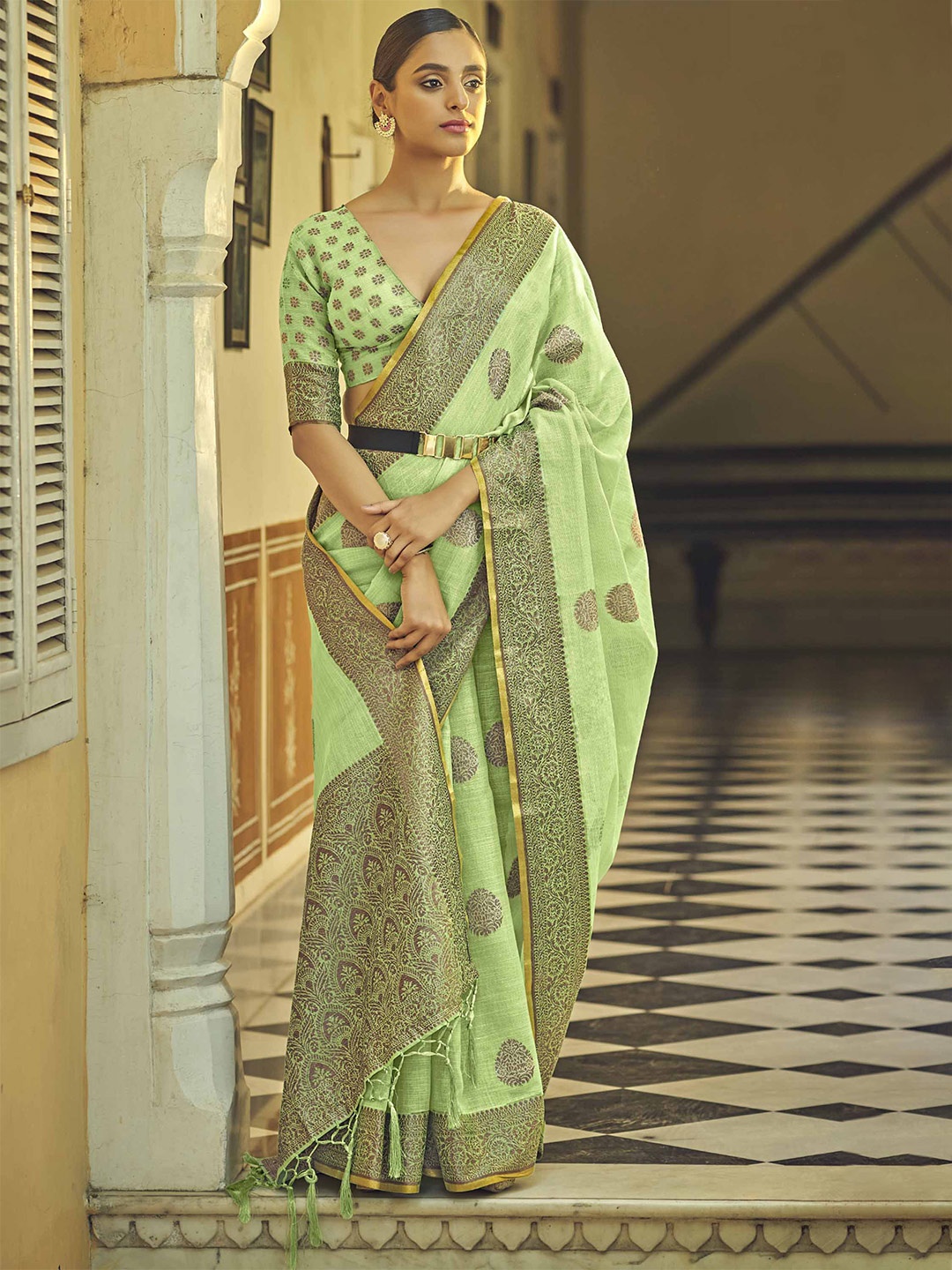 

Anouk Ethnic Motifs Woven Design Zari Linen Blend Saree, Green