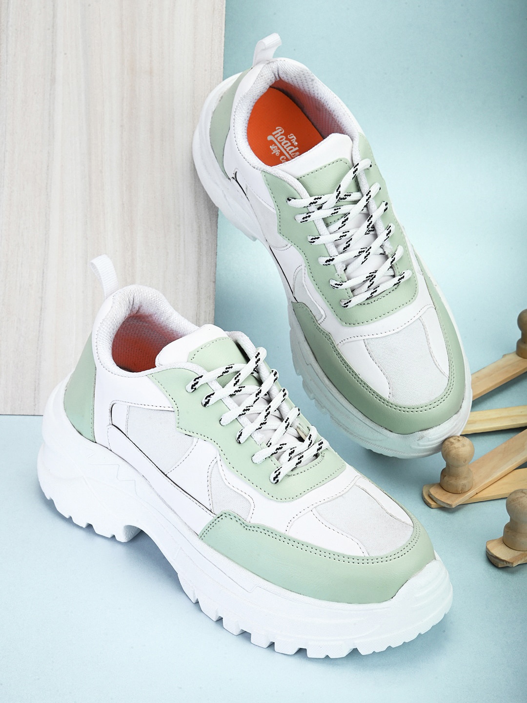 

Roadster Women Sea Green & White Colourblocked Lightweight Padded Contrast Sole Sneakers