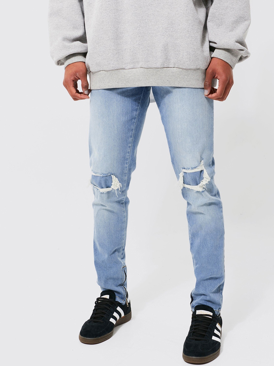 

boohooMAN Mildly Distressed Light Fade Stretchable Jeans, Blue