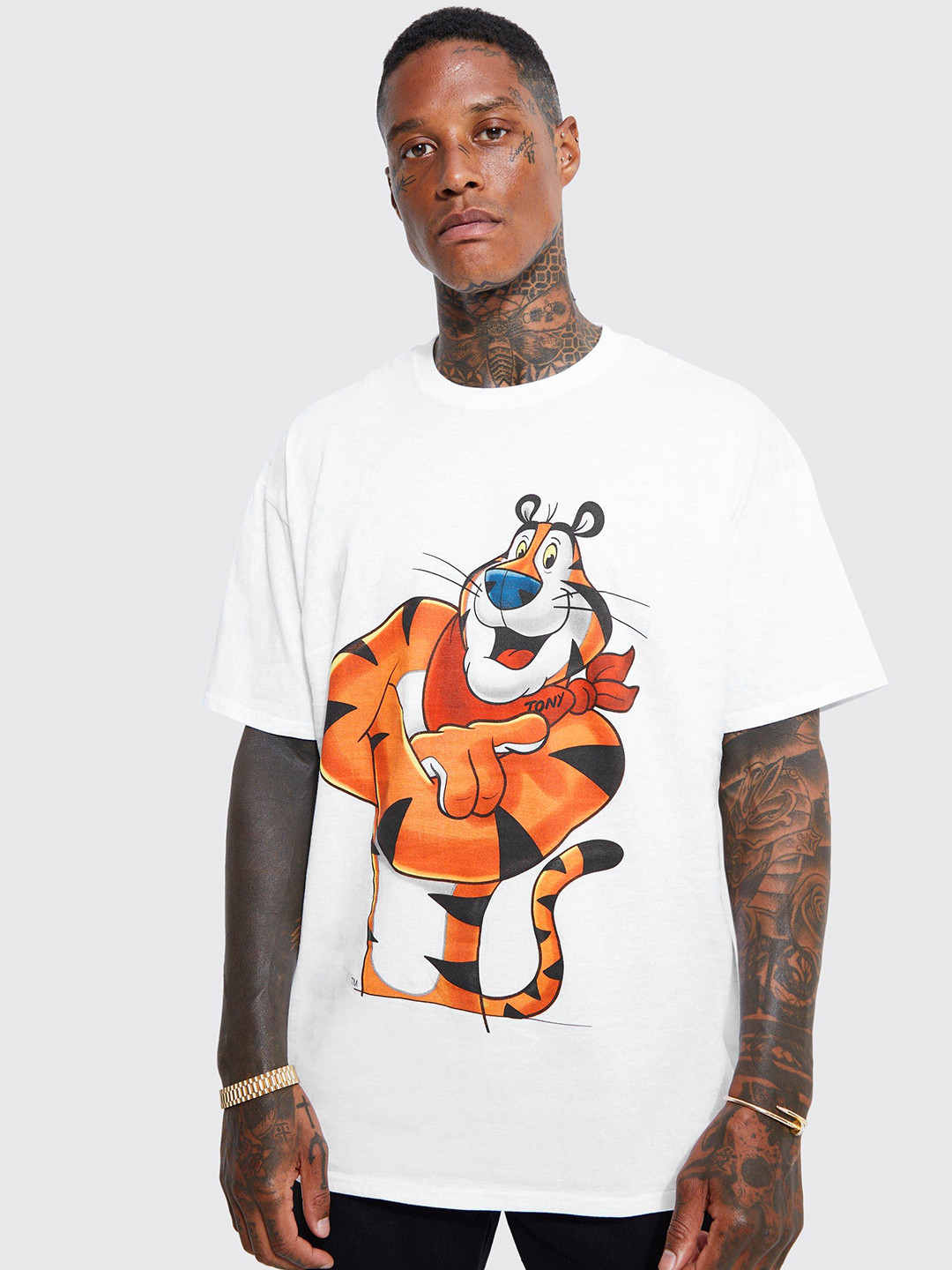 

boohooMAN Kelloggs Tony Tiger Printed Drop-Shoulder Sleeves Pure Cotton Oversized T-shirt, Cream