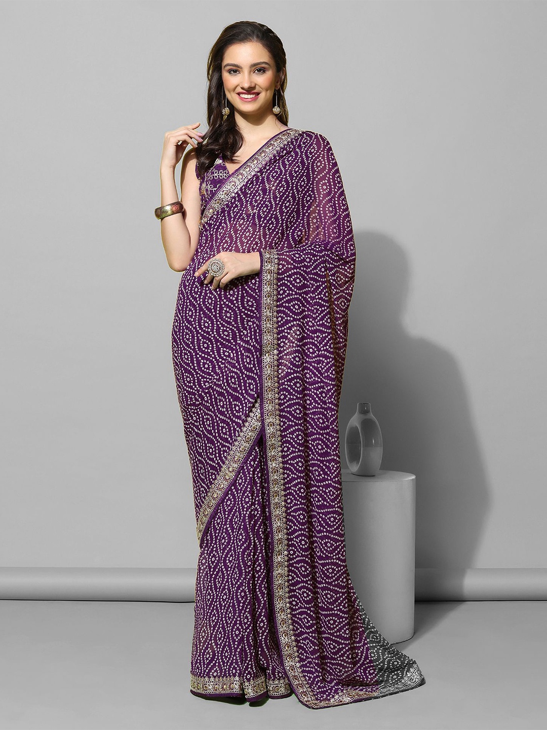 

Mitera Purple & White Bandhani Printed Embroidered Saree