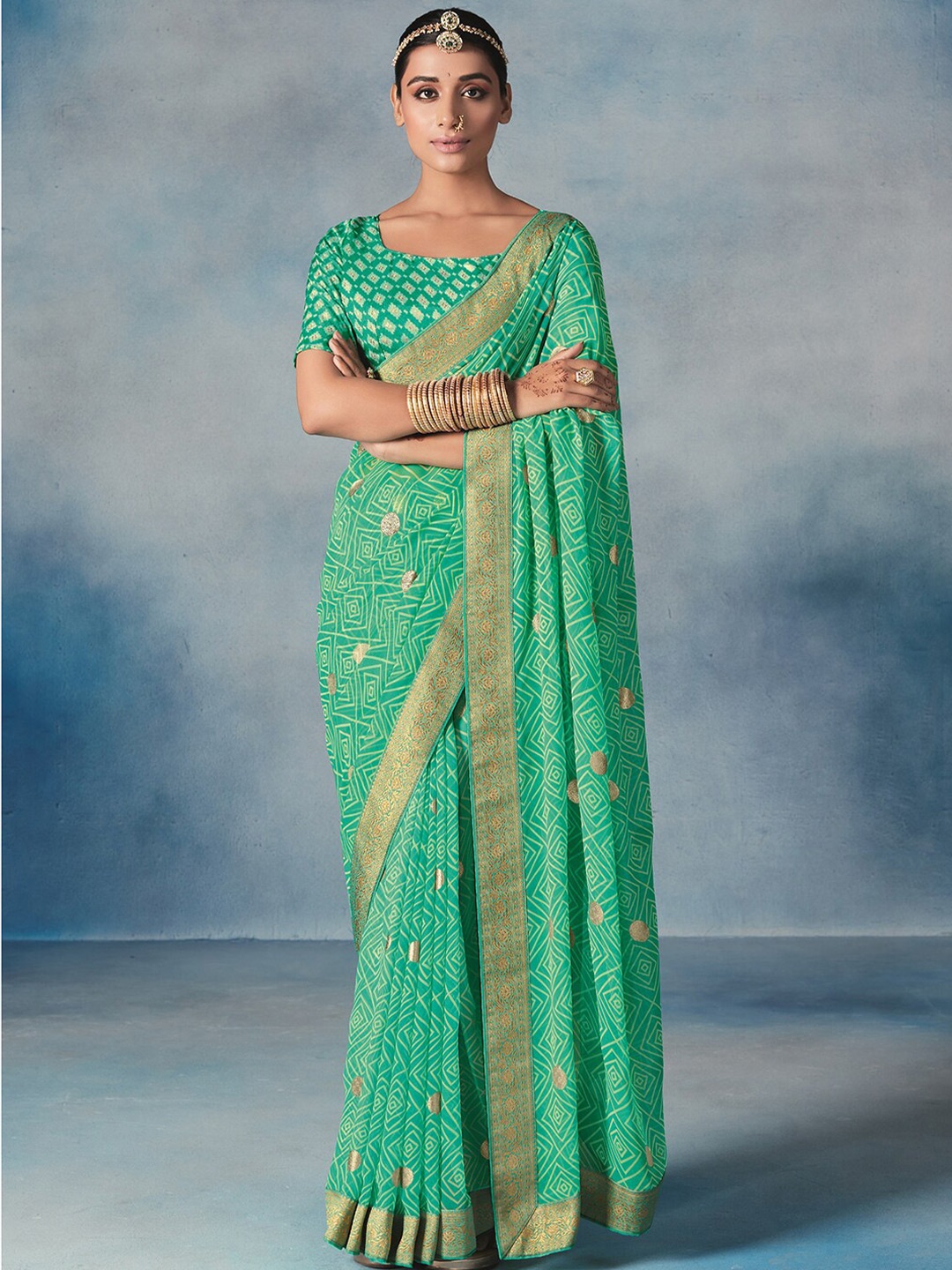 

Satrani Turquoise Blue & Gold Geometric Screen Printed Zari Saree
