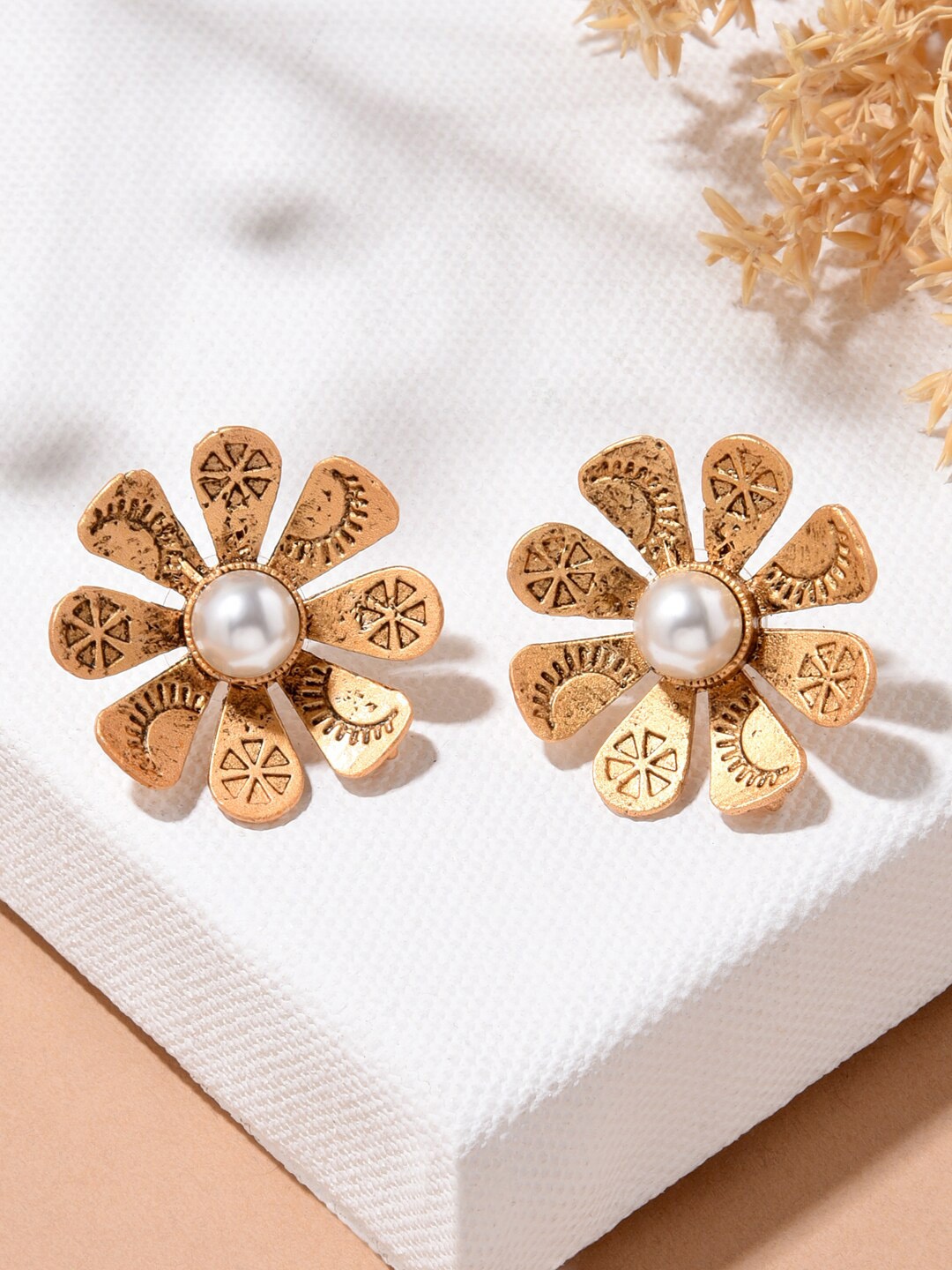 

Fida White Gold Plated Floral Studs Earrings