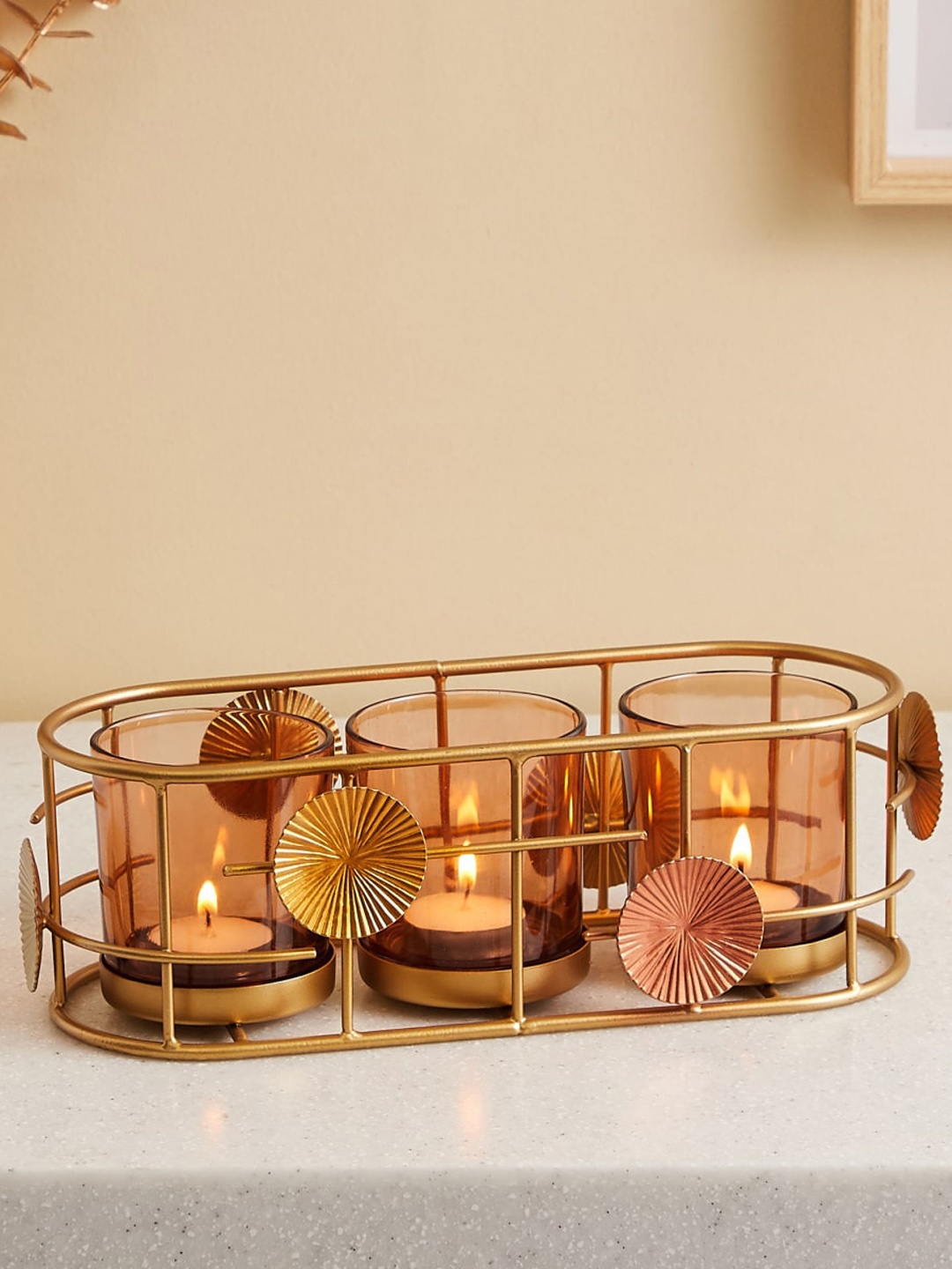 

Home Centre Gold Toned 3 Pieces Glass Votive Holders with Metal Rings