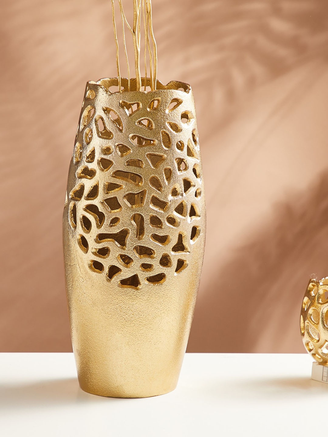 

Home Centre Corsica Zarin Gold Toned Textured Aluminum Vase