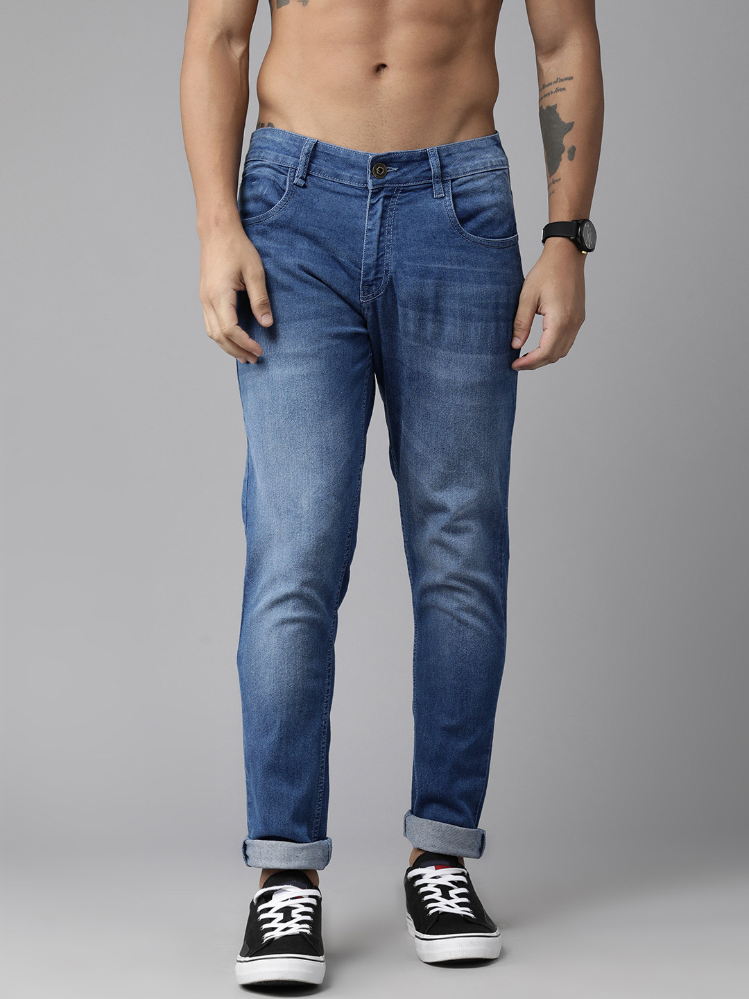 

The Roadster Lifestyle Co. Men Mid-Rise Slim Tapered Fit Heavy Fade Stretchable Jeans, Blue