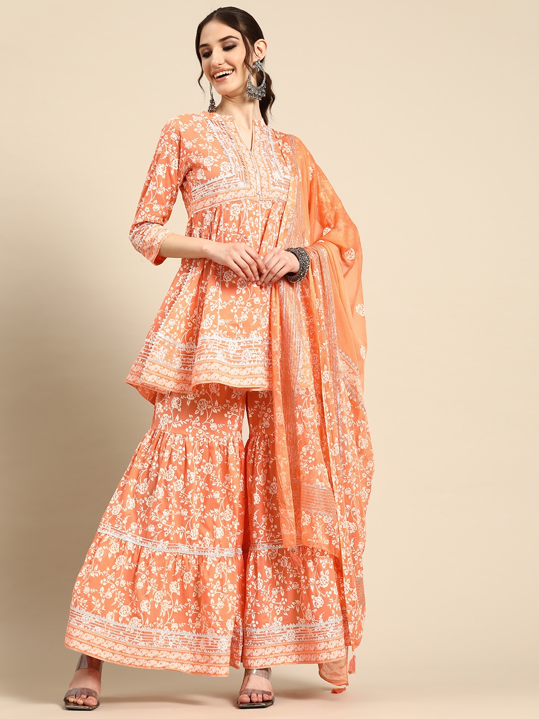 

Sangria Women Floral Printed Gotta Patti Pure Cotton Kurti with Sharara & With Dupatta, Orange