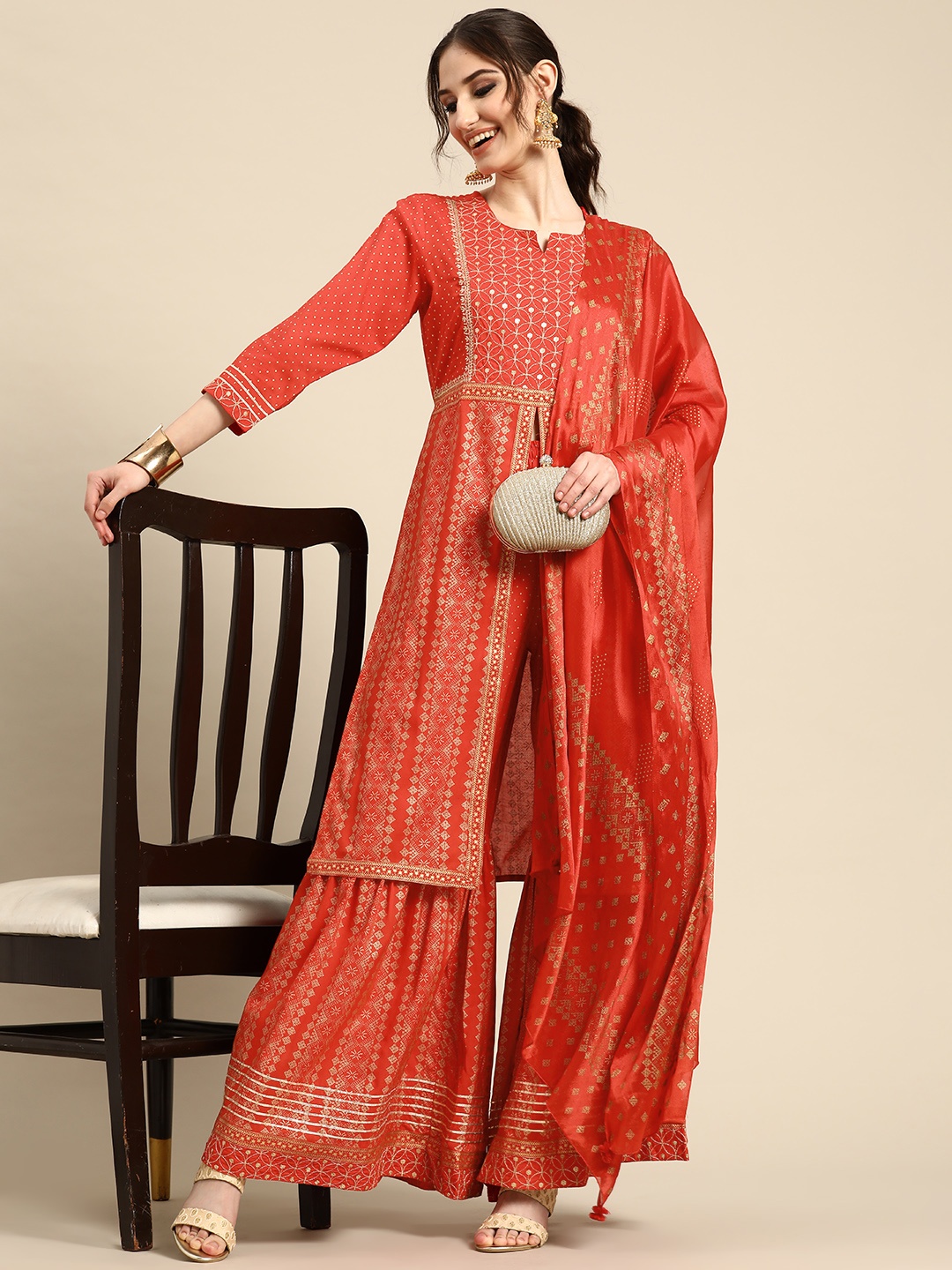 

Sangria Women Ethnic Motifs Embroidered Sequinned Kurta with Sharara & With Dupatta, Red