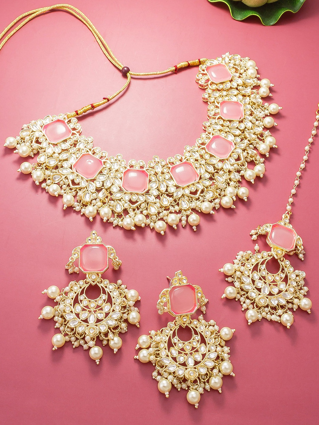 

aadita Gold Plated Kundan Studded & Beaded Jewellery Set