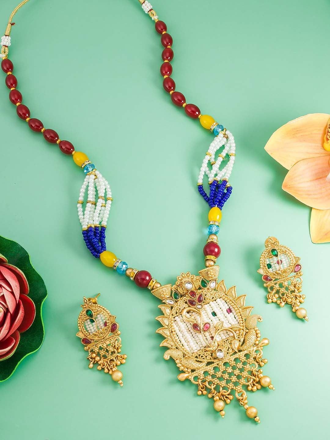 

aadita Gold-Plated Stone-Studded & Pearl Beaded Jewellery Set